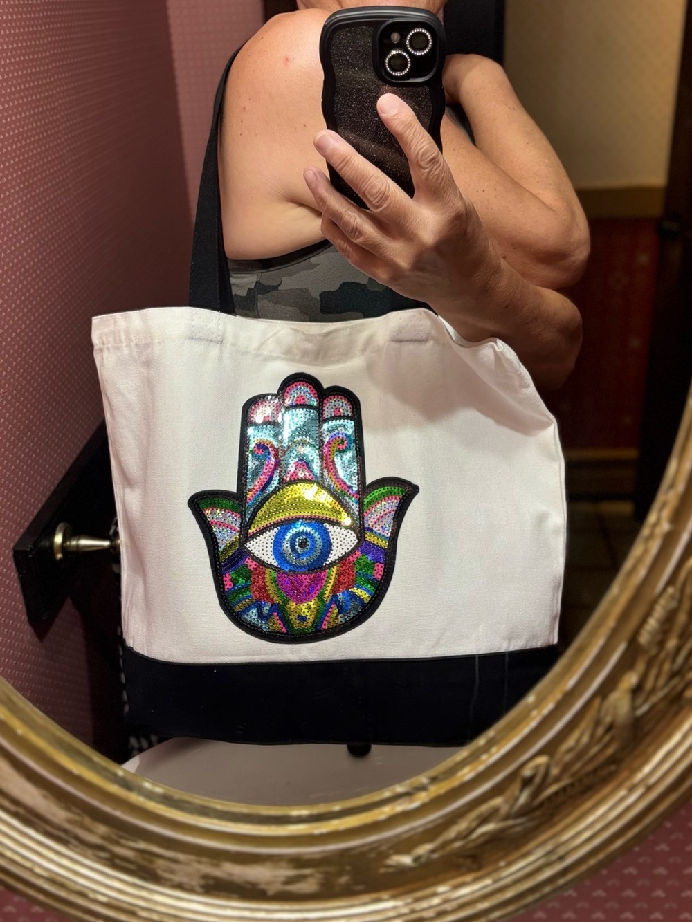 Hamsa sequined embellished hand tote bag.
